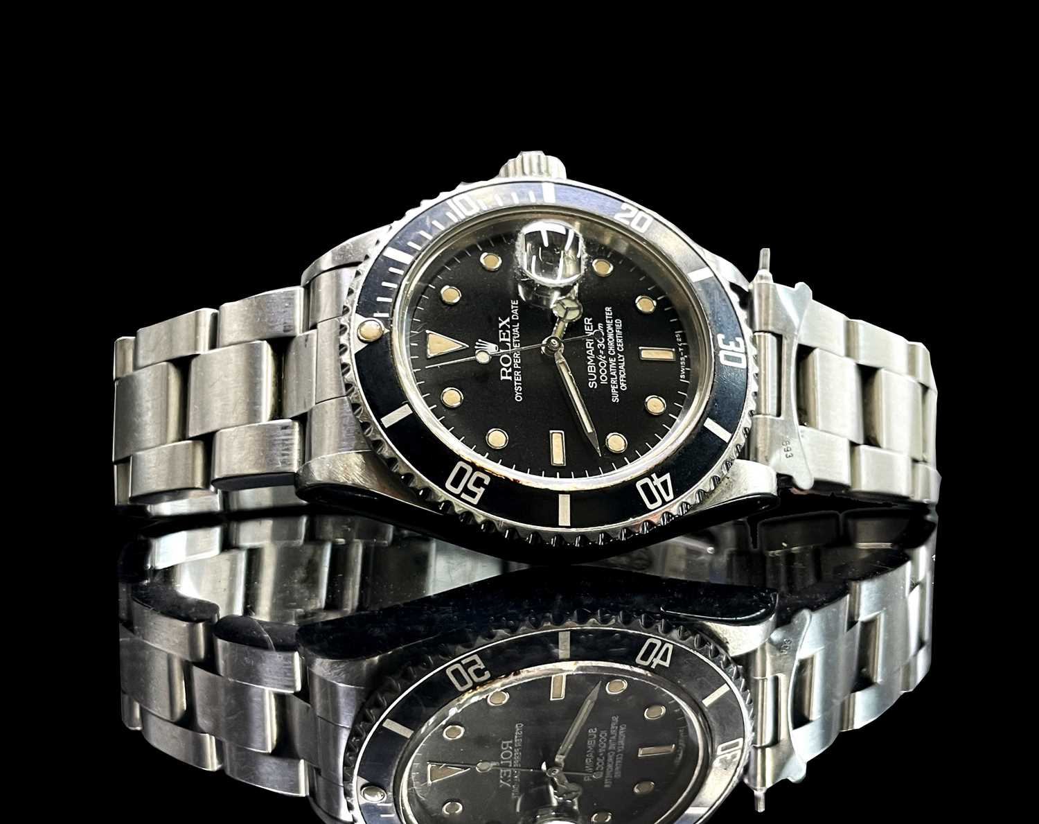 Lot 16 - A Rolex stainless steel Submariner wristwatch...