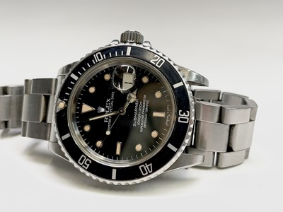 Lot 16 - A Rolex stainless steel Submariner wristwatch...