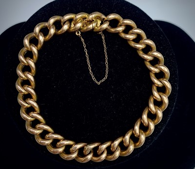 Lot 490 - A 15ct gold curb link bracelet 22.2gm