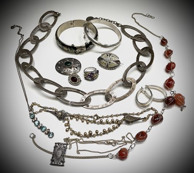 Lot 374 - A silver arts and crafts brooch set with a...