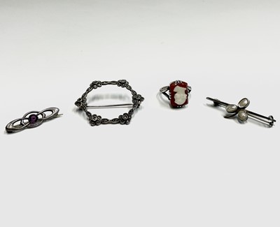 Lot 382 - Three silver brooches and a silver ring 12.2gm