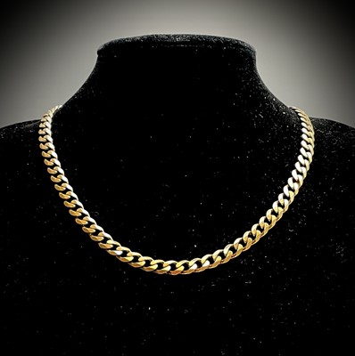 Lot 399 - A 9ct gold curb link 52cm chain 33.6gm