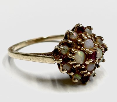 Lot 410 - A 9ct gold ruby and opal cluster ring Size Q 3....