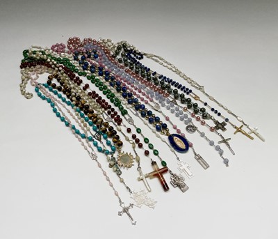 Lot 425 - Fifteen rosary bead necklaces, all with unique...
