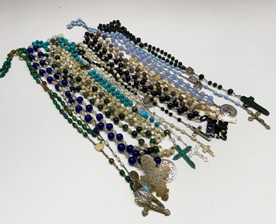 Lot 427 - Fifteen rosary bead necklaces, all with unique...