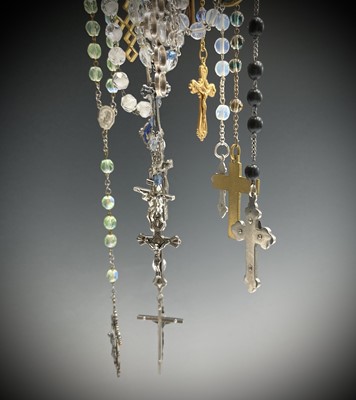 Lot 428 - Fifteen rosary bead necklaces, all with unique...