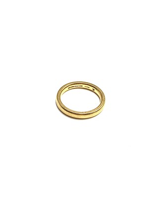 Lot 437 - A 22ct gold band Size J/K 5.1gm
