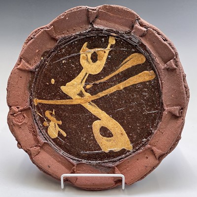 Lot 1034 - Peter Smith Circular slipware plate with...