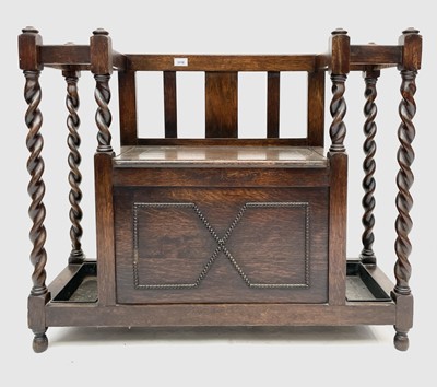 Lot 3110 - A 1920's oak barley twist hallstand, the...