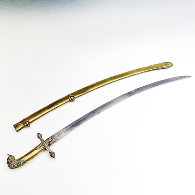 Lot 104 - A Victorian brass sword, with 69cm single...