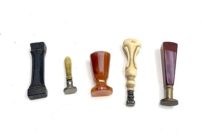 Lot 462 - Five seals- two agate, one ivory, one a black...