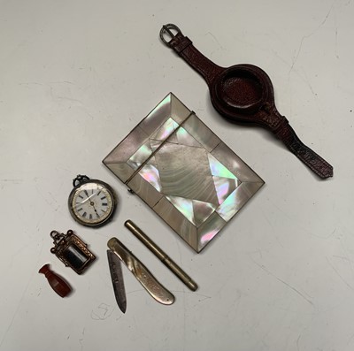 Lot 484 - A pearl veneered card case, a silver fob watch...