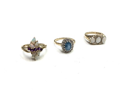 Lot 473 - A 9ct Victorian style ring set with opals and...