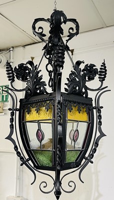 Lot 3209 - A wrought metal stained glass hall lantern,...