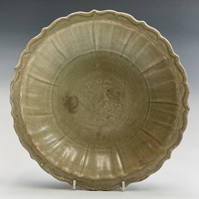 Lot 4 - A Chinese Longquan celadon dish, Ming Dynasty,...