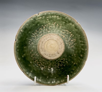 Lot 12 - A Chinese celadon bowl, Ming Dynasty, the...