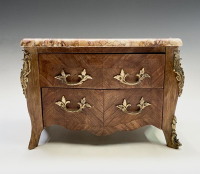 Lot 61 - A French kingwood miniature chest, early 20th...