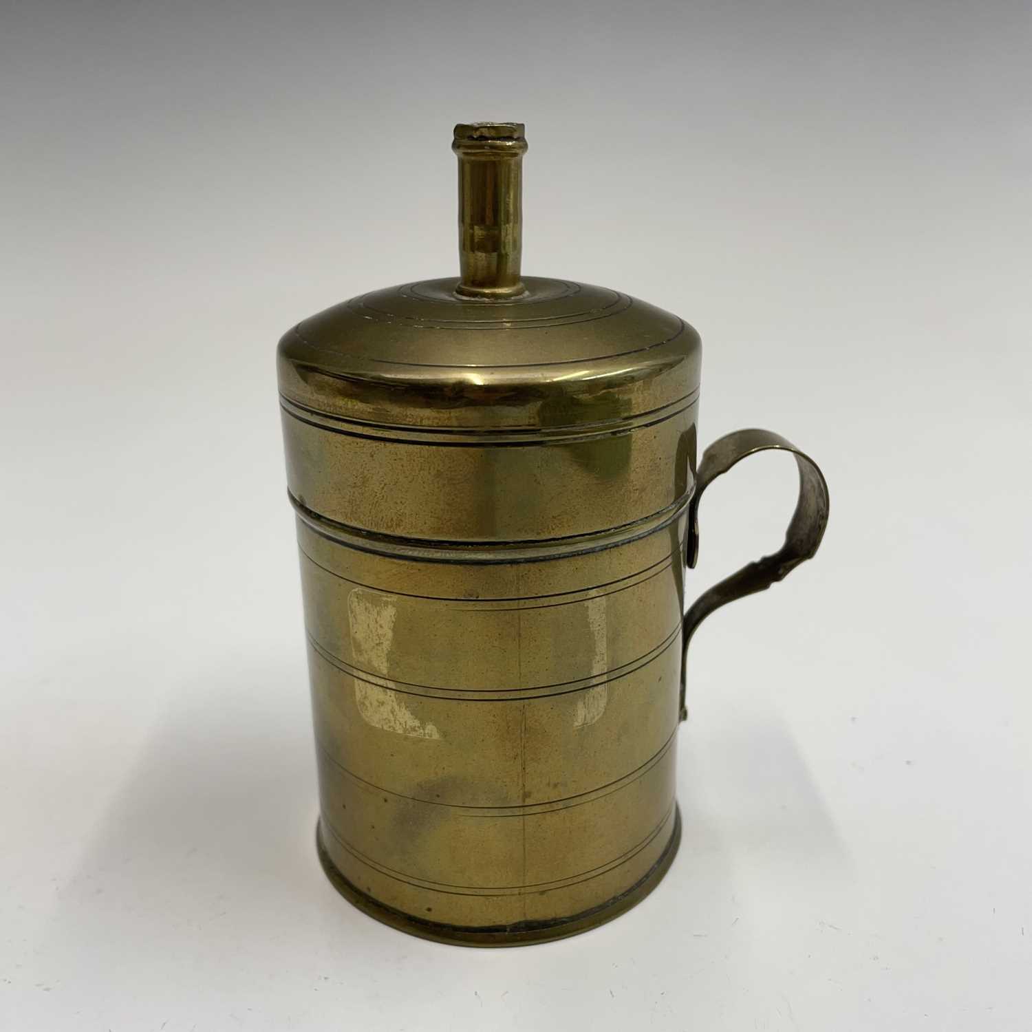 Lot 58 - A brass bougie box, early 19th century, with...