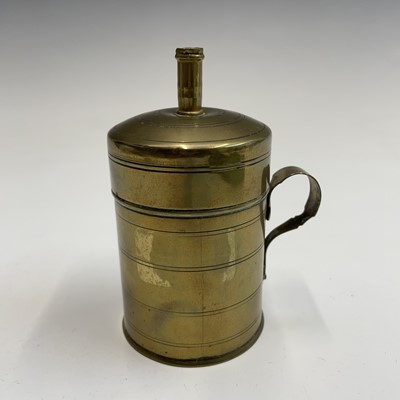 Lot 58 - A brass bougie box, early 19th century, with...
