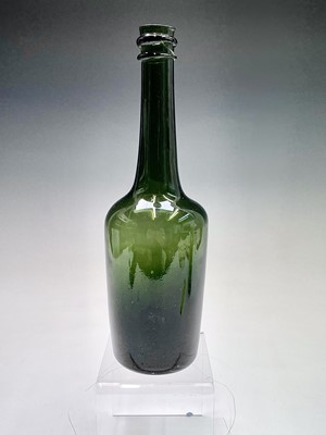 Lot 56 - A late 18th century blown green glass bottle....