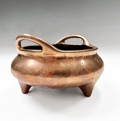 Lot 15 - A Chinese bronze tripod censer, Xuande six...