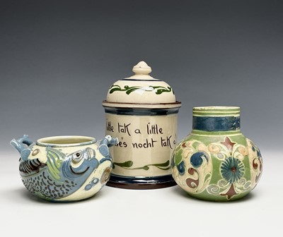Lot 1099 - A C.H.Brannam Barum Pottery small twin handled...