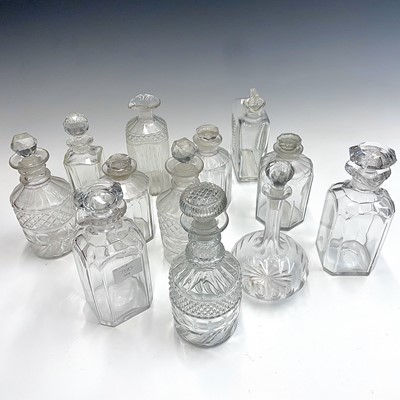 Lot 859 - A set of three Victorian octagonal decanters...