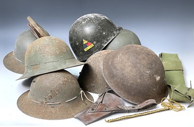 Lot 286 - World War Two and later Military Helmets, etc....