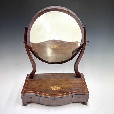 Lot 3130 - A George III mahogany oval dressing table...