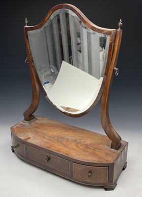 Lot 3131 - A late George III mahogany shield shape...