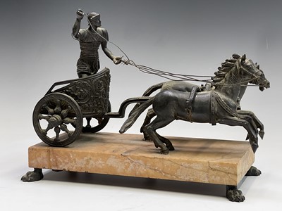 Lot 88 - An Italian bronze group of a chariot racer and...