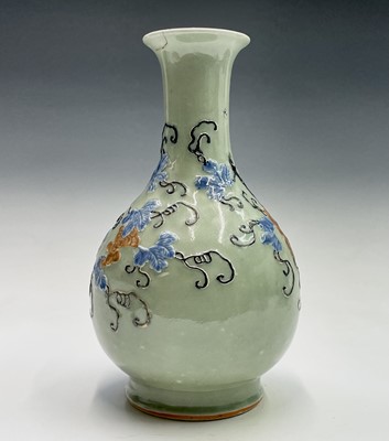 Lot 57 - A Chinese celadon porcelain vase, 19th century,...