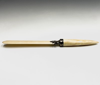 Lot 63 - An ivory and silver mounted paper knife...