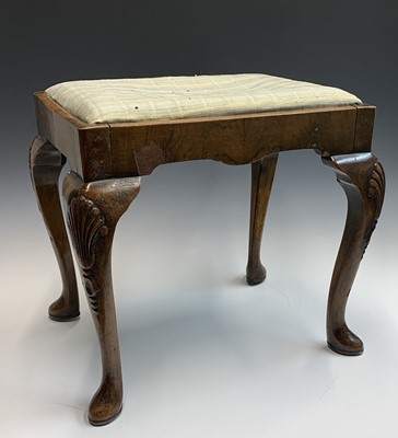 Lot 3233 - A walnut stool, 20th century, raised on...