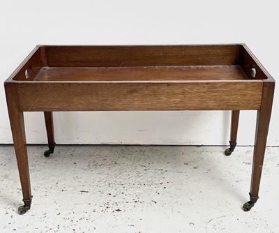 Lot 3240 - A mahogany butler's tray coffee table, 20th...