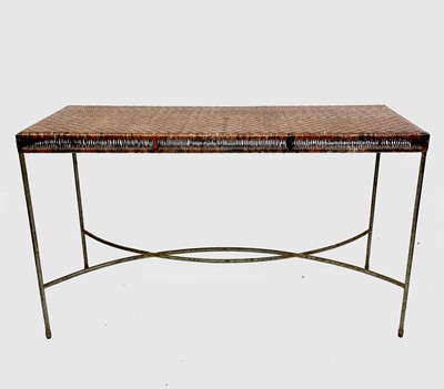 Lot 3180 - A contemporary steel framed table with rattan...