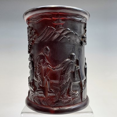 Lot 114 - A Chinese resin brush pot, decorated with...