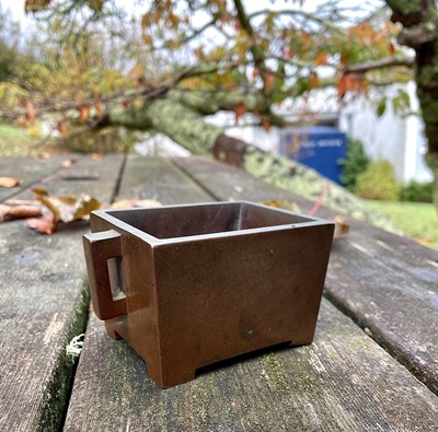 Lot 55 - A Chinese bronze rectangular censer, Qing...