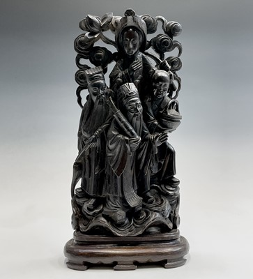 Lot 46 - A Chinese carved wood group of four of the...