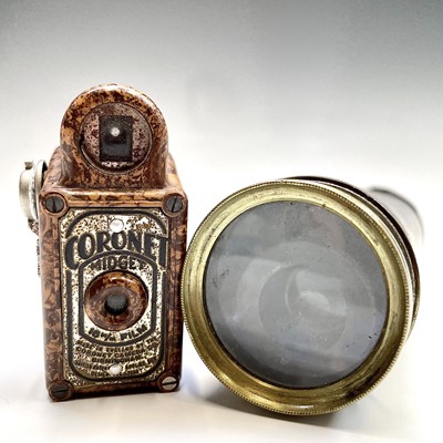 Lot 92 - A Coronet Midget brown bakelite camera, height...