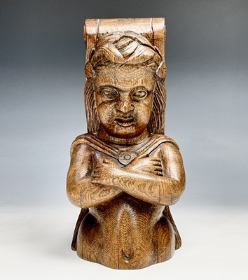 Lot 289 - A carved oak half length female figure on a...