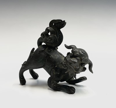 Lot 40 - A Chinese bronze model of a dog of fo, 19th...
