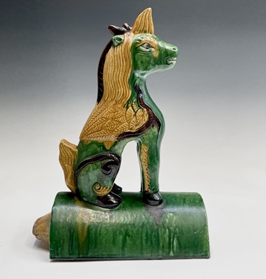 Lot 122 - A Chinese Sancai glazed pottery ridge tile,...
