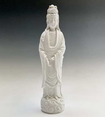 Lot 23 - A large Chinese blanc de chine figure of a...