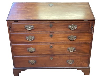 Lot 3172 - A George III mahogany bureau, the fall front...