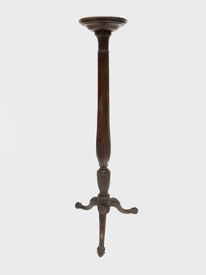 Lot 3125 - A Georgian style mahogany torchere on a tripod...