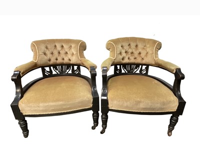 Lot 3191 - A pair of Victorian ebonised tub chairs, with...