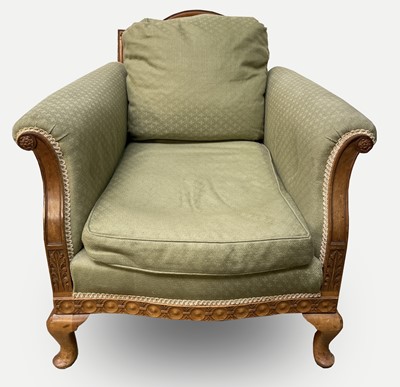 Lot 3193 - A 1930s walnut Bergere armchair with...