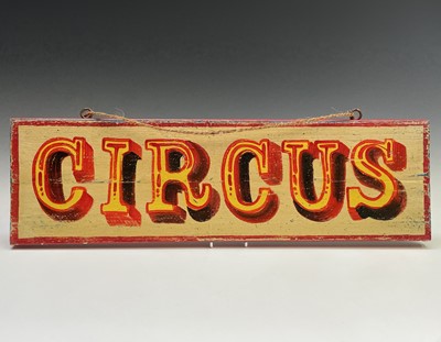 Lot 248 - A sign written wooden sign 'CIRCUS'. 19.5 x 66cm.
