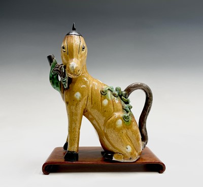 Lot 32 - A Chinese sancai-glazed teapot in the form of...